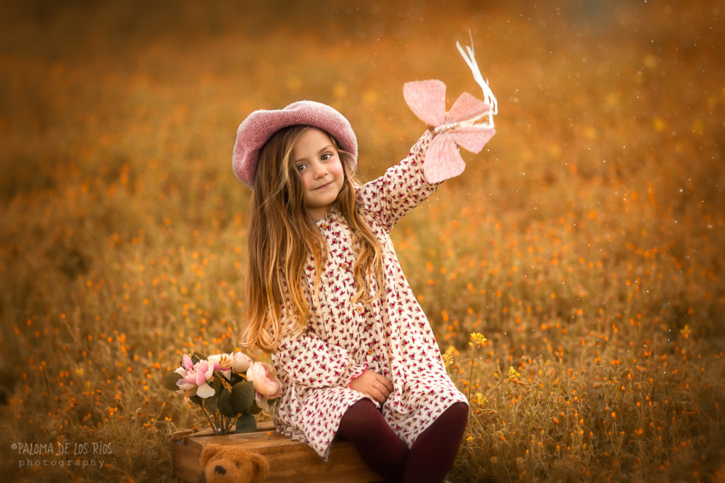 niña con mariposa